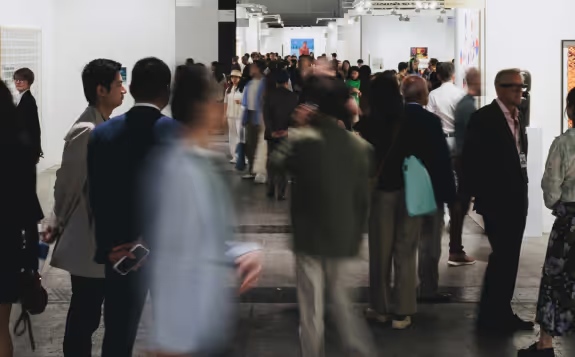 A crowd of people at a conference